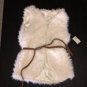 A fluffy vest with a belt
